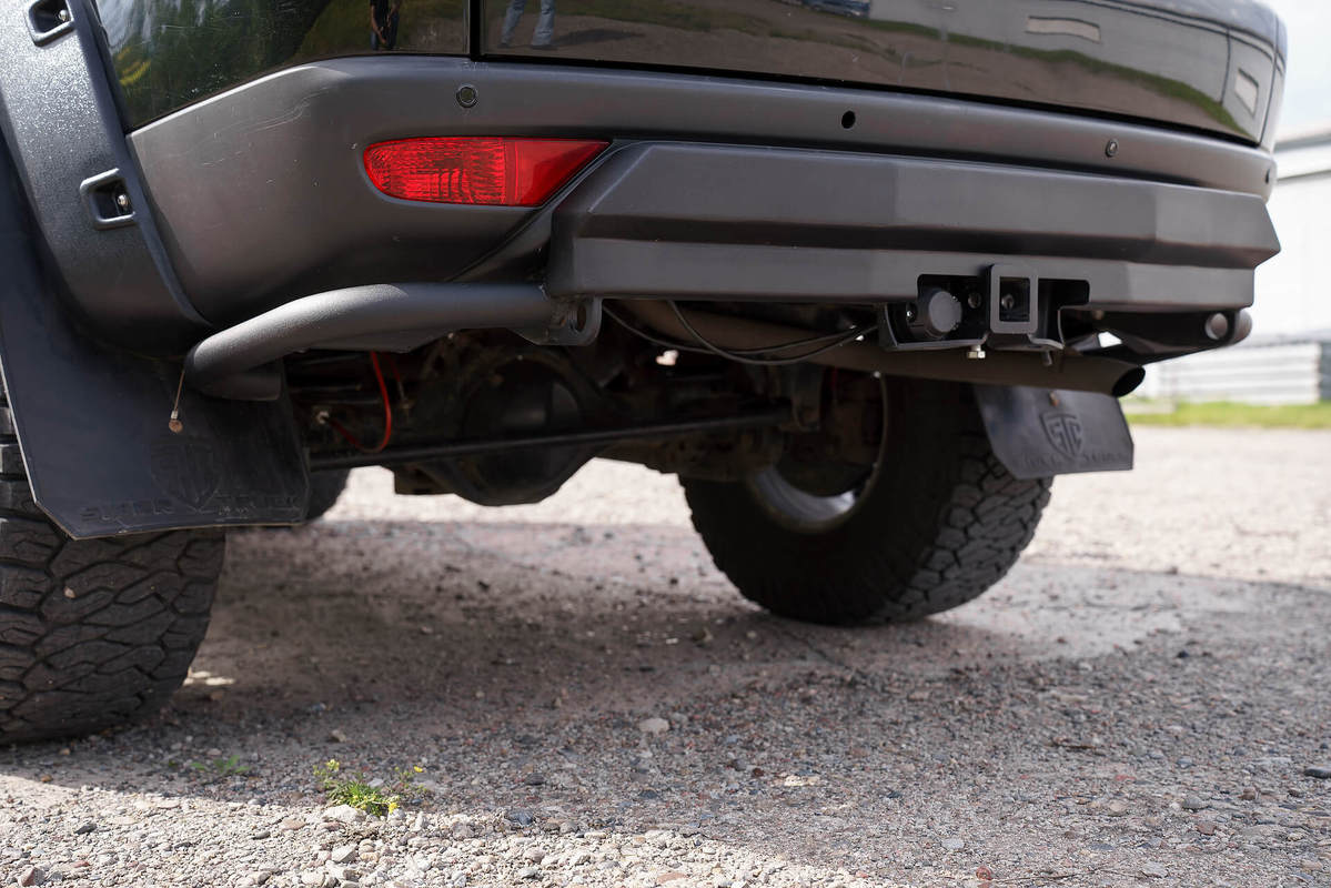 Бампер задний Mitsubishi Pajero Sport 2008-2015 (Облегченный)