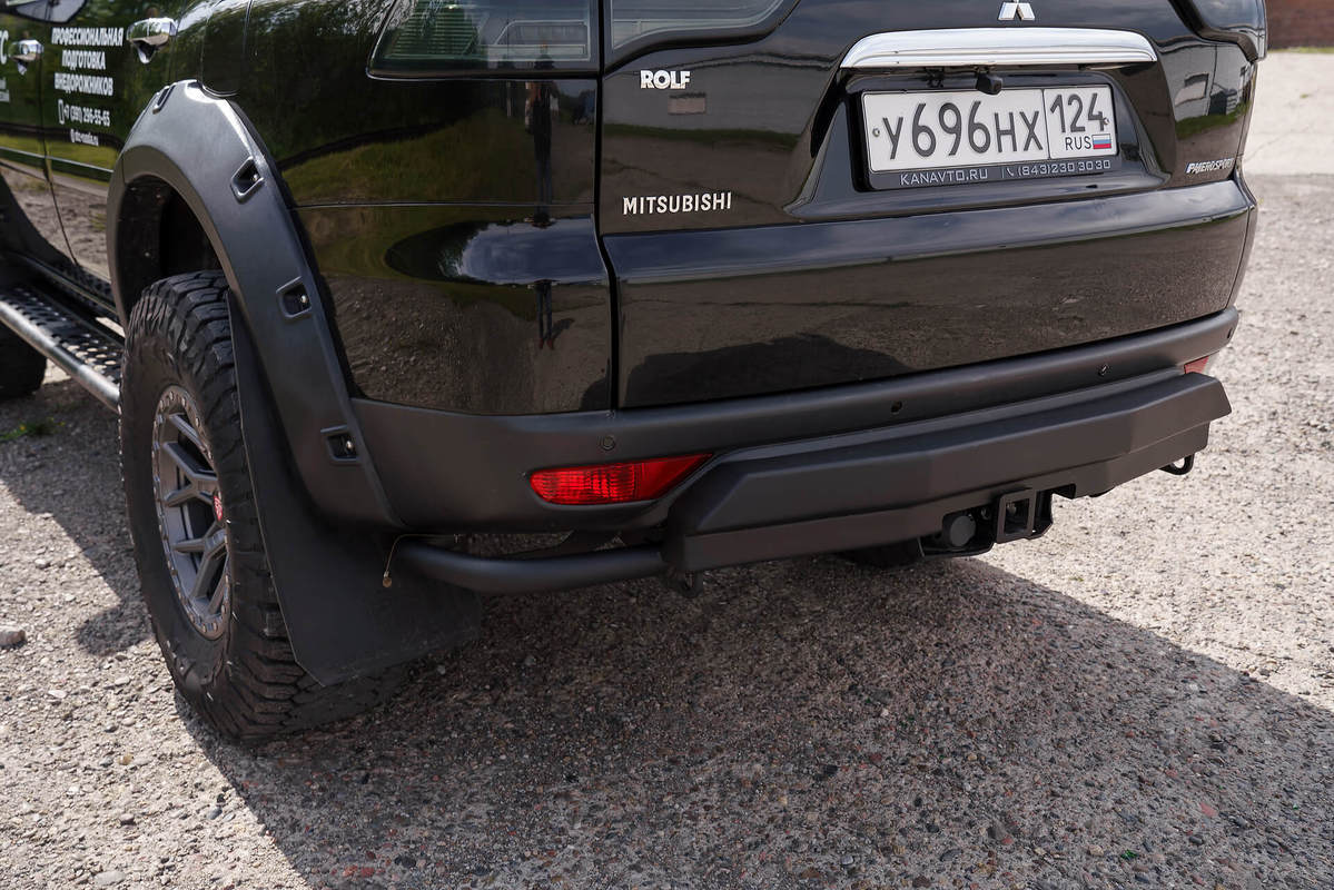 Бампер задний Mitsubishi Pajero Sport 2008-2015 (Облегченный)