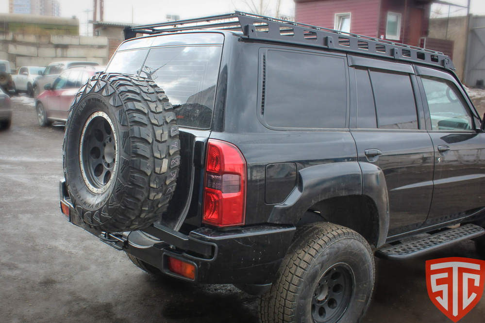 Калитка в штатный бампер Nisan Patrol Y61 (c 2004 г.в) (с квадратом по фаркоп)